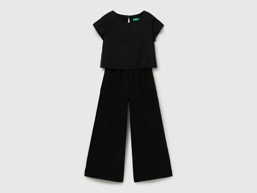 böljande jumpsuit med kort ärm